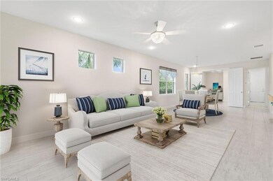 Living room featuring recessed lighting, visible v