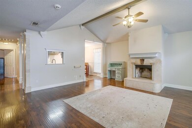 Unfurnished living room featuring lofted ceiling w