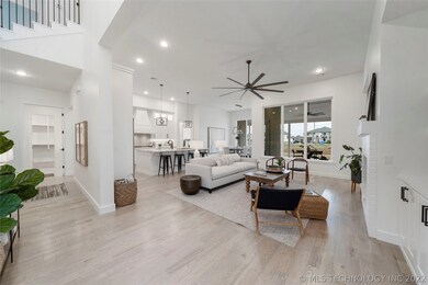 View from Entry into Family Room/ Kitchen.