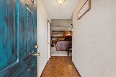 Entryway featuring hardwood / wood-style floors