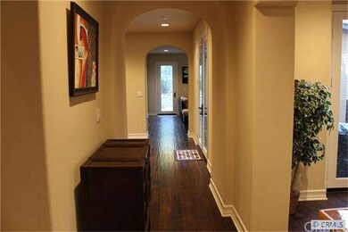 ENTRYWAY WITH HARDWOOD FLOORS