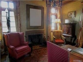 1 of 3 fireplaces-notice the herringbone design