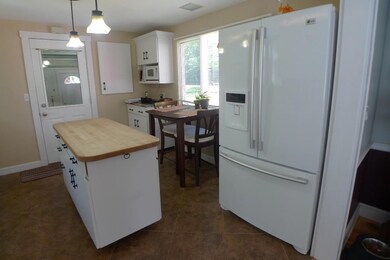 Kitchen showing breakfast area.