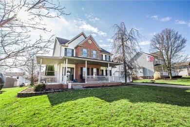 View of front of property featuring a front yard and a porch