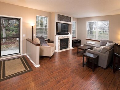 View to family room surrounded by windows for natu