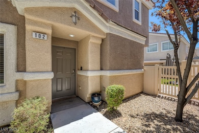 Entrance to property featuring stucco siding