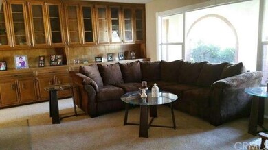 Bright & Open Formal Living Room with Built-ins