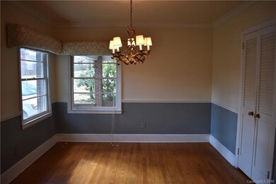Dining room off the kitchen has double doors for p