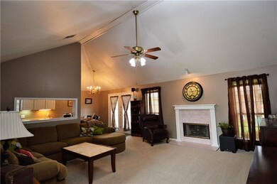 Huge Living room with fireplace and ceiling fan! P