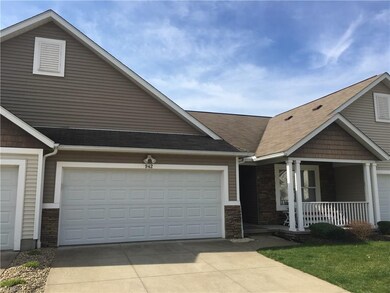 2 Car garage with door opener and stone accents