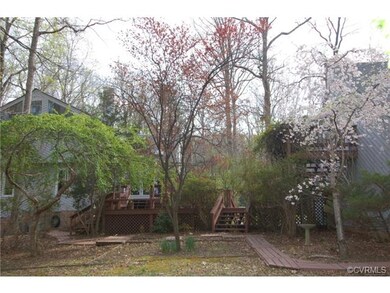 Rear View of the House and Garage. The owner worke