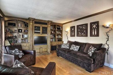 sophisticated living room with built in entertainm
