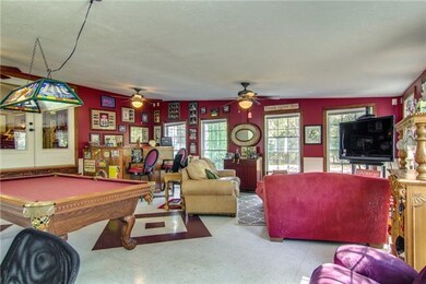 Wet bar, cable hook up for your tv and a pool tabl