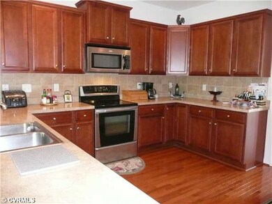 Kitchen - Kitchen with Tile Backsplash and Stainle