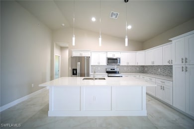 The Island Kitchen Comes With Quartz Countertops,