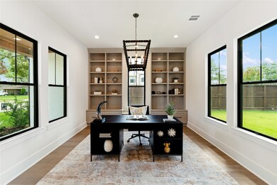 Bright and spacious home office features built-in