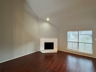 Reverse view of living room, large window to look