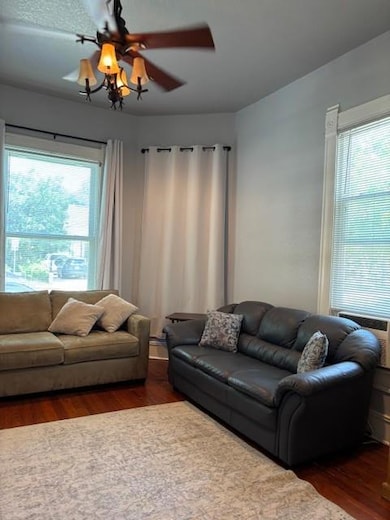 Living area featuring wood finished floors and a 
