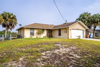 1243 Ermine St E, Lehigh Acres, FL 33974 - photo 2