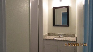 Master bath has granite counter top vanity.