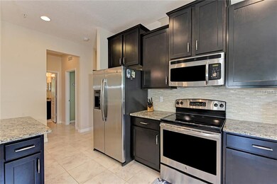 Stainless Appliances with tile backsplash. Stainle
