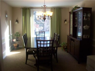 Dining Room. The gracious picture windows in the b