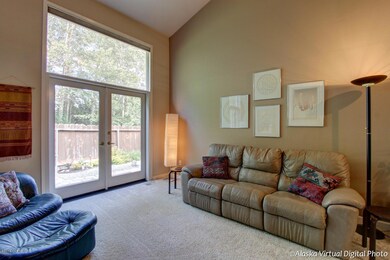 Vaulted great room w/window walls
