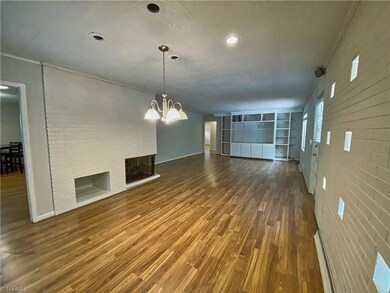 Dining Room - Den with Fireplace
