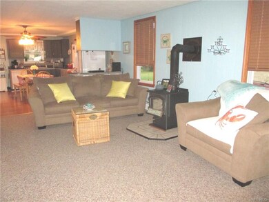 Spacious Living Room with W/B Stove.