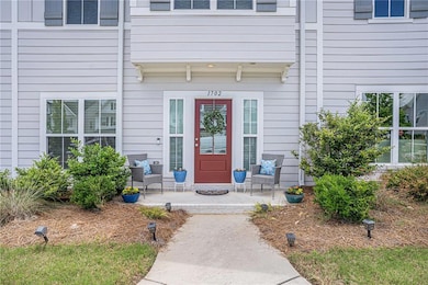 Property entrance featuring covered porch