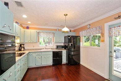 Separate dining room with pass through window into