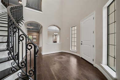 Front Entry With High Ceilings & Natural Lighting