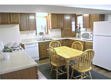 Kitchen. Hardwood floors.  Tons of cabinets.  Nice