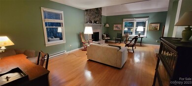 Office area in LR with Gas Logs in FP with chase