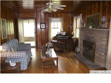 A wood burning fireplace adds warmth to the great 
