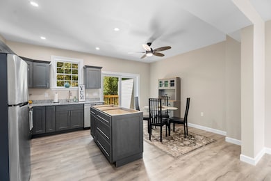 Opt to keep a dining table or go with just the newest trend of kitchen island seats only when you bring in your own furnishing touches