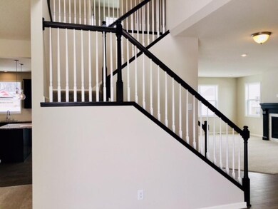 Lovely 2 story front entry with handrails and spin