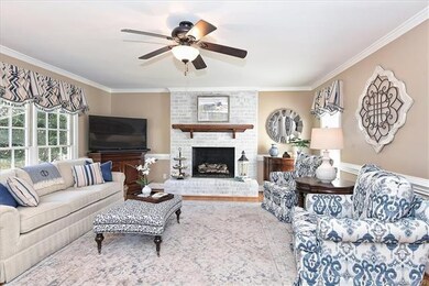 Large Family Room w/white washed fireplace
