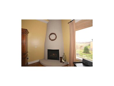 Dramatic floor to ceiling gas fireplace