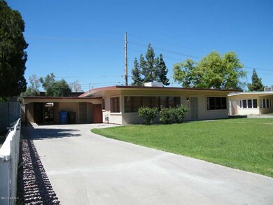 Large lot with guest house in back.