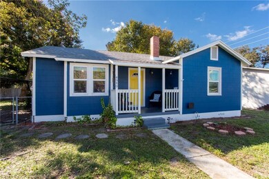Adorable front porch with lots of sunlight and a cover for shade