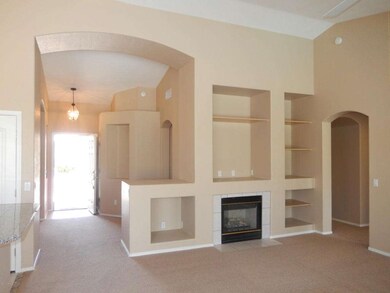 FRONT ENTRY-GREAT ROOM W/FP & BUILT-INS