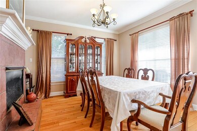 Dining room with double sided fireplace and plenty