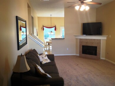Spacious living room with new carpet and new paint