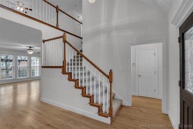 entry area w staircase, view of living