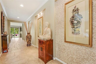 Entry Hall to back yard with custom tile work on w