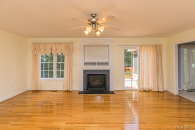 Living Room with gas fireplace and hardwood floors