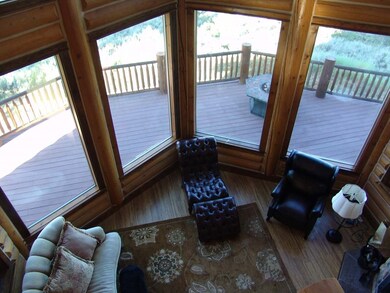 Living Room With Floor To Ceiling Windows