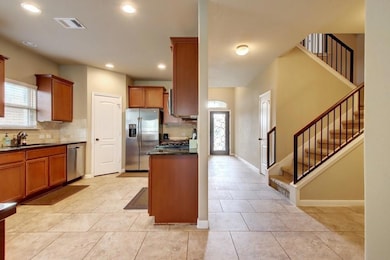 Kitchen open to living and dining space