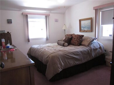 Master bedroom with custom window treatments